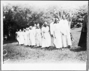 Procession of bridal couples on their way to church, Arusha, Tanzania, 1929