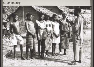 Mr Tanyi, the Leprosy Inspector, speaks to patients