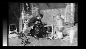 A young cobbler, Chengdu, Sichuan, China, ca.1945