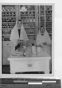 Sisters at dispensary at Wuzhou, China, 1938