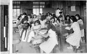 Maryknoll Sisters Anne Vincent and Concepcion teaching a science class at Catholic school in Lucena, Philippines, 1947