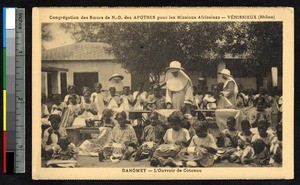 Girls learning how to sew in the courtyard, Cotonou, Benin, ca. 1900-1930