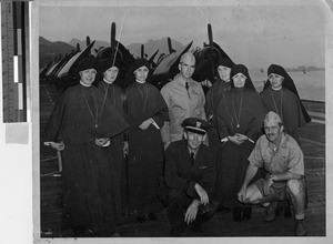 Maryknoll Sisters on the deck of the USS Bairoko, Hong Kong, China, ca. 1945