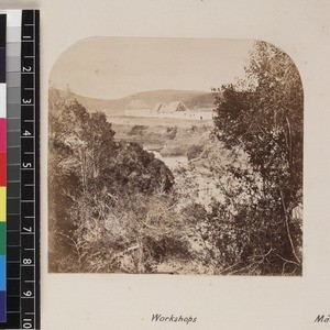 View of workshops through trees, Mantasoa, Madagascar, ca. 1865-1885