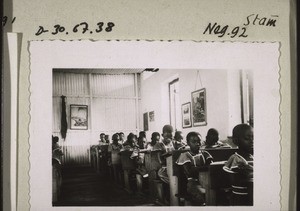 A class of the Junior School in Akropong in their classroom