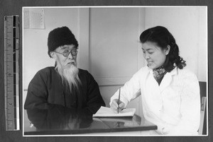 Social worker and patient, Jinan, Shandong, China, 1941