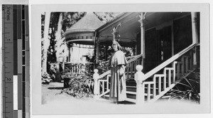 Sister Veronica Hartman, MM, standing in front of the Maryknoll Convent, Punahou, Honolulu, Hawaii, 1928