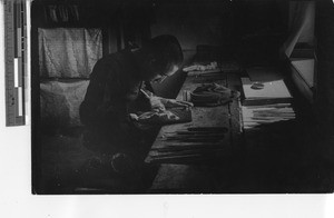 A woodcarver at Fushun, China, 1936