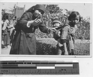 Chinese Sister with children at Jiangmen, China, 1937