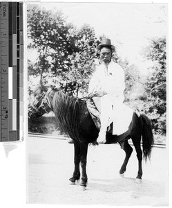 Portrait of a man riding a burro, Korea, ca. 1920-1940