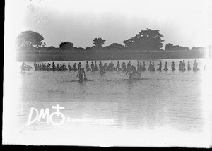 African people fishing with baskets, Makulane, Mozambique, ca. 1896-1911