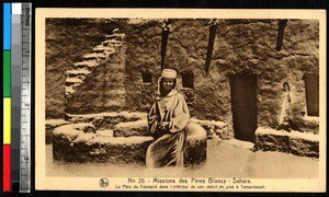 Father Foucauld in front of an adobe house, Algeria, ca.1920-1940