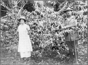 Mr. and Mrs. Rohde in front of a coffee plantation, Boloti, Tanzania