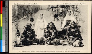 Missionary sisters sitting with female catechumens, India, ca.1920-1940