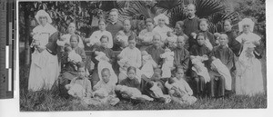 Frs. Cairns and McShane at French Convent with orphans at Hong Kong, China, 1921