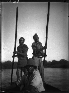 African men on a boat, Antioka, Mozambique, ca. 1916-1930