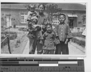 A widow and her children at Fushun, China, 1928