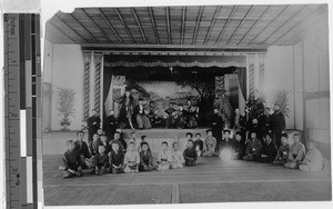 Actors on stage in conference hall of Tsumatsukurei, Osaka, Japan, ca. 1909