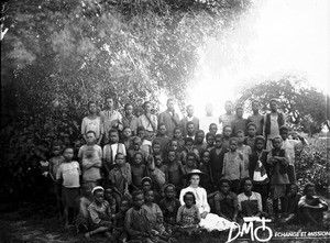 Mathilde Perrenoud with a group of African children, Antioka, Mozambique, 1906