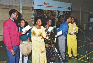 Hilder and Brighton Kahigi with guest students from abroad at the DMS national convention in Fr