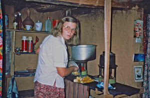 United Mission to Nepal. DSM Missionary and Teacher,Tove Madsen, preparing food at Namjung, Gor