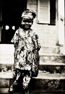 Girl in traditional outfit, Nigeria, ca. 1936