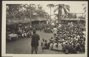 Mission festival, 1937 in Ebo, at that time 'Lower Bakobngwan', with the evangelist Abraham Mba. Four translators were needed