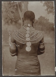 Kamba woman with jewelry and decorative scars, Tanzania