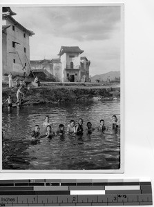 Boys swimming in Shantou, China, 1941