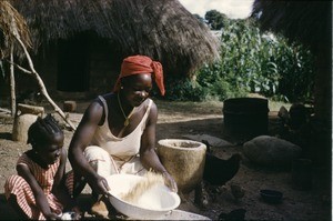 Woman and girl preparing food, Banyo, Adamaoua, Cameroon, 1953-1968