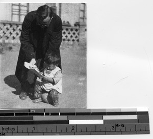 Fr. Escalante and Chinese boy at Tunghua, China, 1934