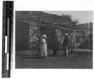 Maria Nakin in front of her house in Emtumasi, South Africa East