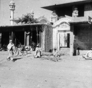 Danish Pathan Mission. The Gospel in Pakistan, 1954-1958. Street view with a Muslim minaret at