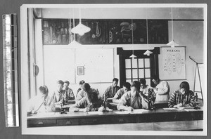 Working in biology laboratory, Jinan, Shandong, China, ca.1940