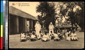 Women and girls making lace with missionaries, India, ca.1920-1940