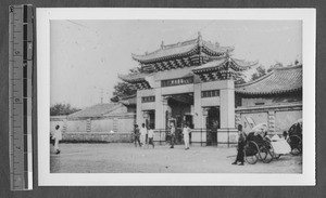 Wide view of alumni gate, Jinan, Shandong, China, ca.1940