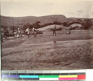 Men fishing in a brook, Soatanana, Madagascar, ca.1906