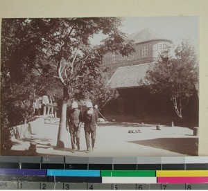 Thorkild Rosaas and Bernt Svendsen walking in the Antsahamanitra courtyard, Antananarivo, Madagascar, 1901