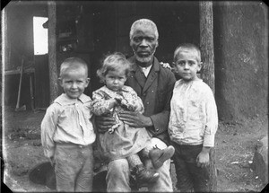 African man and missionary's children, southern Africa, ca. 1880-1914