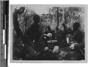 Wanyamwezi cooking and eating (1), East Africa