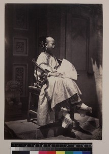 Portrait of Manchu girl in traditional costume, Beijing, China, ca. 1861-1864