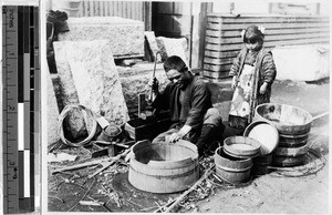 Japanese man building a bucket, Japan, August 1932