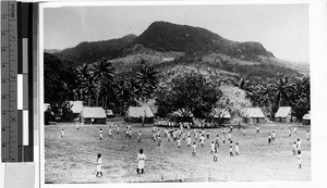 Group of people standing in a field, Oceania, ca. 1920-1940