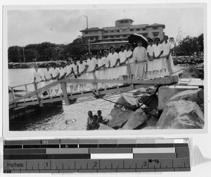 Group portrait of a Maryknoll Sister and student nurses, Manila, Philippines, ca. 1920-1940