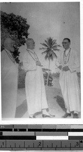 Three priests standing together outside, Dar es Salaam, Tanzania, Africa, October 1946