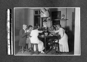 Missionaries eating a Chinese meal, Fujian, China, ca.1911-1913