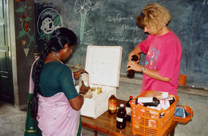 Kalrayan Hills, South India. Nurse and volunteer, Karen Randrup with her medicine kit, 1994