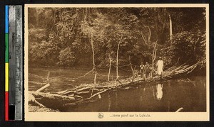 Clergy and children posing on bridge, Lukula, Congo, ca.1920-1940