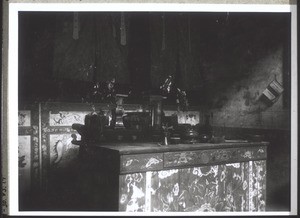 Altar for a deity in Laulung (the deity is behind the curtain.)