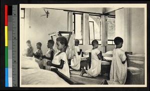 Bedtime prayers at home for girls, Congo, ca.1920-1940